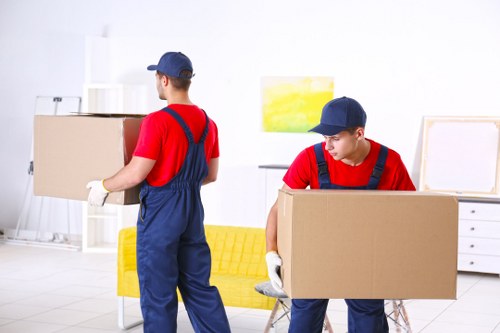 Removal team helping with a house move in Watford