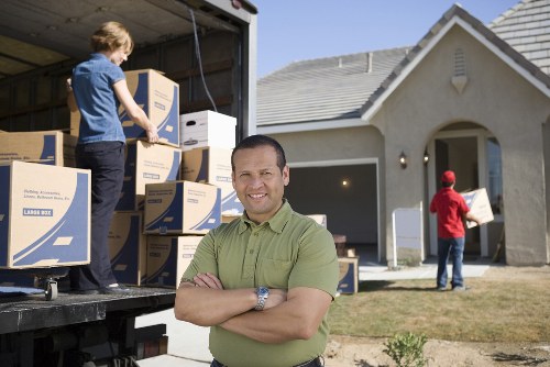 Packing office furniture and equipment for a Watford move