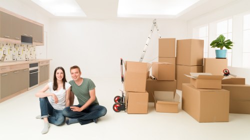 Team loading furniture for a house move in Watford