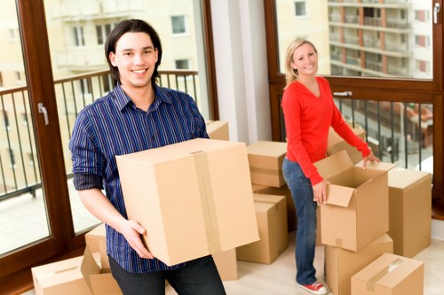 Boxes and furniture ready for loading into a removals van